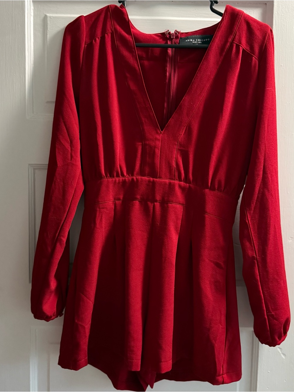 Stunning red Akira shorts long sleeved romper